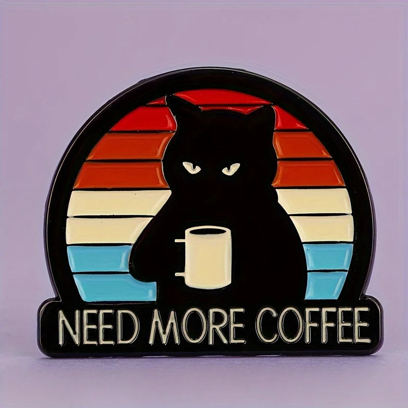 Front view of metal enamel Need More Coffee cat brooch on lilac background, vintage sunset design.