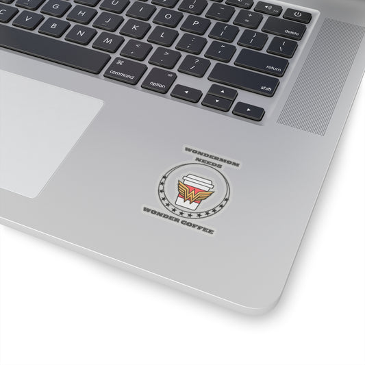 WonderMom Needs Wonder Coffee round vinyl sticker decorating a silver laptop—perfect funny gifts decal for coffee‑loving moms.