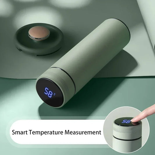 Green Sage Thermos smart water bottle with digital temperature display showing 58°C, featuring a touch-activated screen on the lid for real-time temperature measurement.