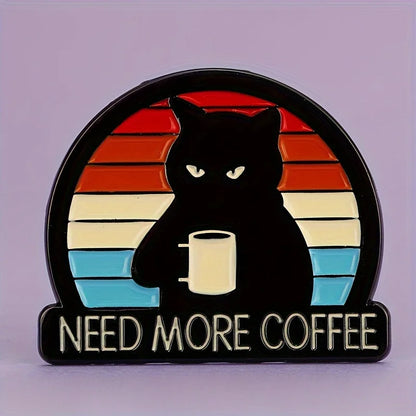 Front view of metal enamel Need More Coffee cat brooch on lilac background, vintage sunset design.