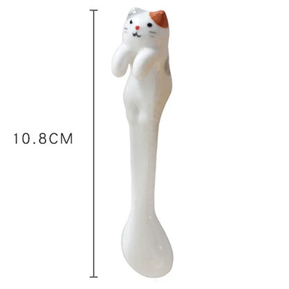 Dimension graphic showing 10.8 cm length of single cat‑handle coffee spoon—compact yet eye‑catching funny gifts accessory.

