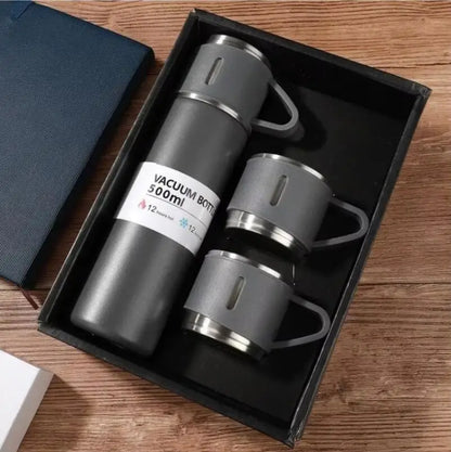 Charcoal grey vacuum bottle tumbler cups set with two stainless‑steel cups presented in sleek presentation box.